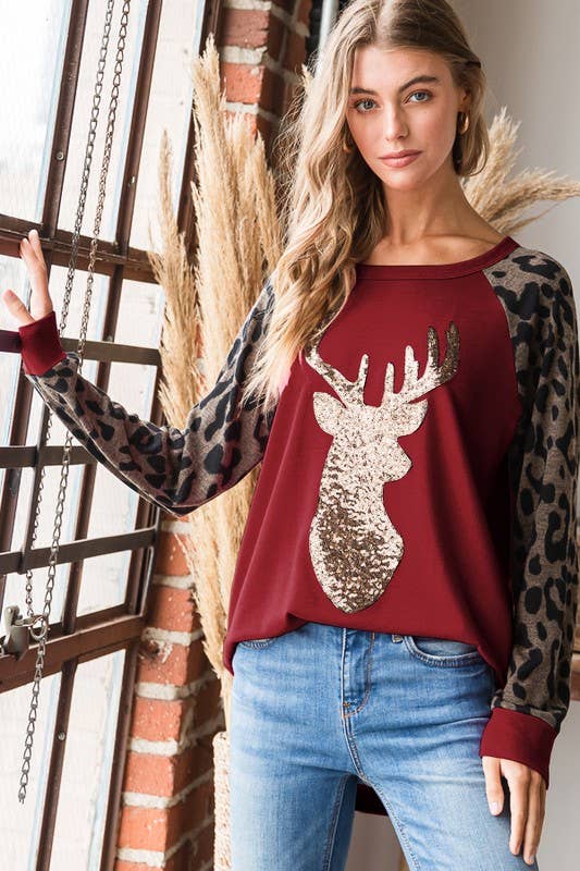 SOLID AND ANIMAL TOP WITH REINDEER PATCH